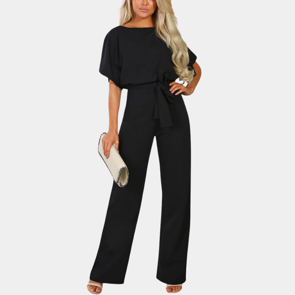 Stijlvolle groene dames jumpsuit met korte mouwen en strikceintuur, ideaal voor casual en formele gelegenheden. Comfortabele pasvorm, modieuze look.