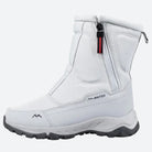 Weiße Winterstiefel mit Reißverschluss, warmem Futter und rutschfester Sohle. Ideal für kalte Temperaturen. Perfekte Wintermode für Damen.