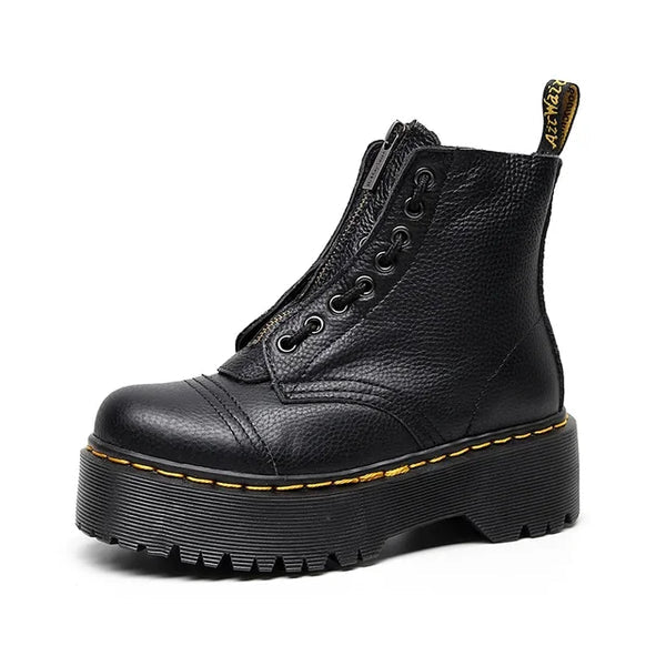 Schwarzer Plateau-Stiefel mit Reißverschluss, robustem Leder, gelber Naht und dicker Sohle. Perfekt für trendige, urbane Looks.