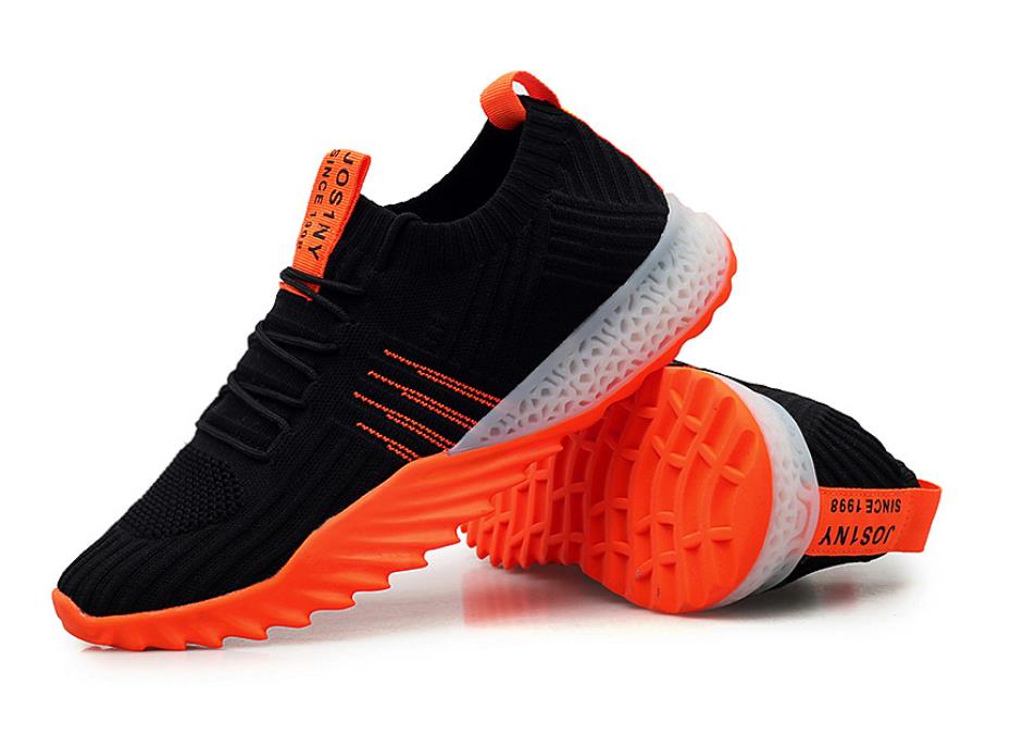 Schwarze Sportschuhe mit orangefarbener Sohle, atmungsaktiv, rutschfest, für Herren.