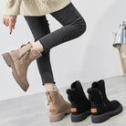 Damen-Winterstiefel mit Fellfutter, rutschfeste Sohle, in Beige und Schwarz. Perfekt für kalte Tage, modisch und funktional.