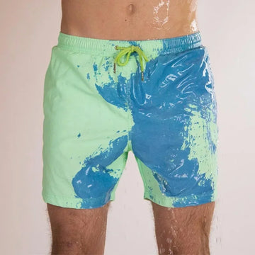 Herren-Badeshorts, grün mit blauem Farbklecks, elastischer Bund, Kordelzug.