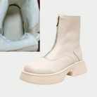Damenstiefel aus cremefarbenem Leder mit Reißverschluss und Plateauabsatz, gefüttert für Komfort. Modische Winterstiefel, trendige Schuhe.