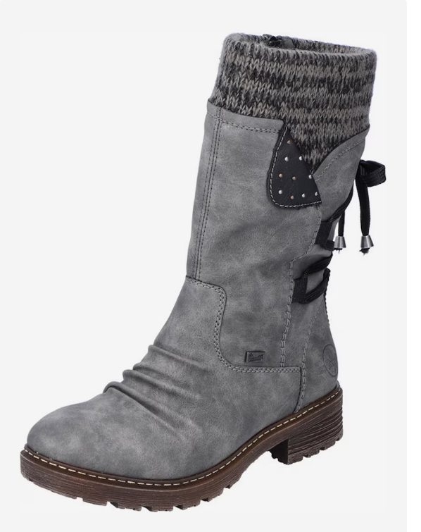 Grauer Damenstiefel mit Strickbund, Zierschleifen und Nieten. Robuste Sohle, ideal für Herbst und Winter. Modisch, bequem, vielseitig.