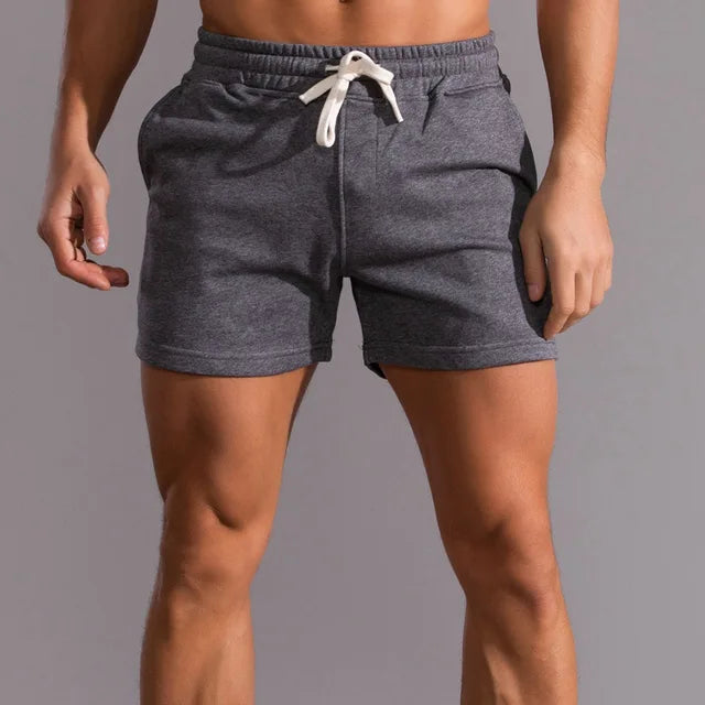 Herren-Shorts aus 100% Baumwolle, grau, mit Seitentaschen und Reißverschluss. Hochwertige, modische Sommer-Shorts für Freizeit und Sport.
