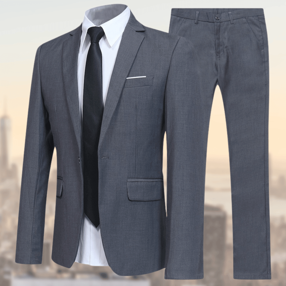 Eleganter grauer Herrenanzug mit Sakko und Hose, ideal für Business und formelle Anlässe. Hochwertiger Stoff, klassisches Design, zeitloser Stil.