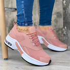 Damen Sneaker in Rosa mit weißer Sohle, sportlich und modisch, ideal für Freizeit und Fitness. Bequeme Turnschuhe für Damen.