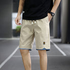 Beige Herren-Shorts, sportlich, Sommermode, Fitness, atmungsaktiv, urbaner Stil.