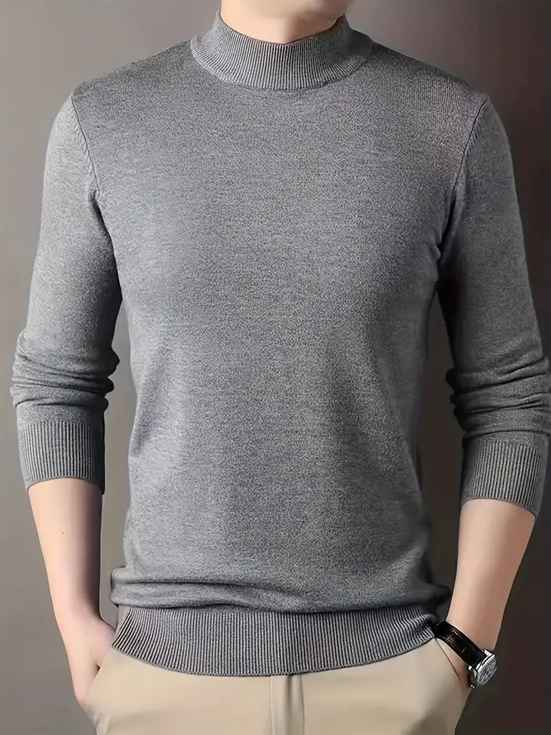 Grauer Herrenpullover aus feinem Strick, langärmelig, ideal für Herbstmode. Eleganter Look, perfekt für Business und Freizeit.