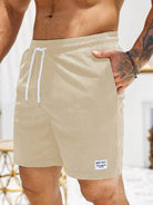 Beige Herren-Shorts aus Cord mit Kordelzug, lässig, Sommermode, Taschen, Stickerei-Logo.