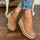 Damen-Stiefeletten mit Keilabsatz in Beige, aus Leder, modisch und bequem. Perfekt für Herbstmode. Hochwertige Verarbeitung und stilvolles Design.
