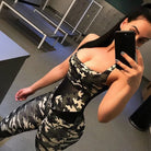 Damen Camo Sportoutfit, einteilig, ideal für Fitness und Yoga. Stilvolles Tarnmuster, atmungsaktiv, elastisch, Größe XS. Perfekt für Sportbegeisterte.