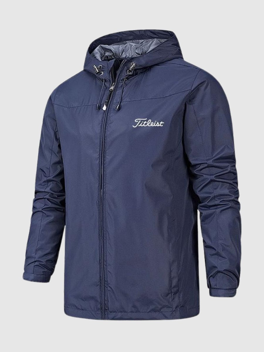 Wasserdichte Herrenjacke in Dunkelblau mit Kapuze, Reißverschluss und "Titleist"-Logo. Ideal für Outdoor-Aktivitäten und Golf.