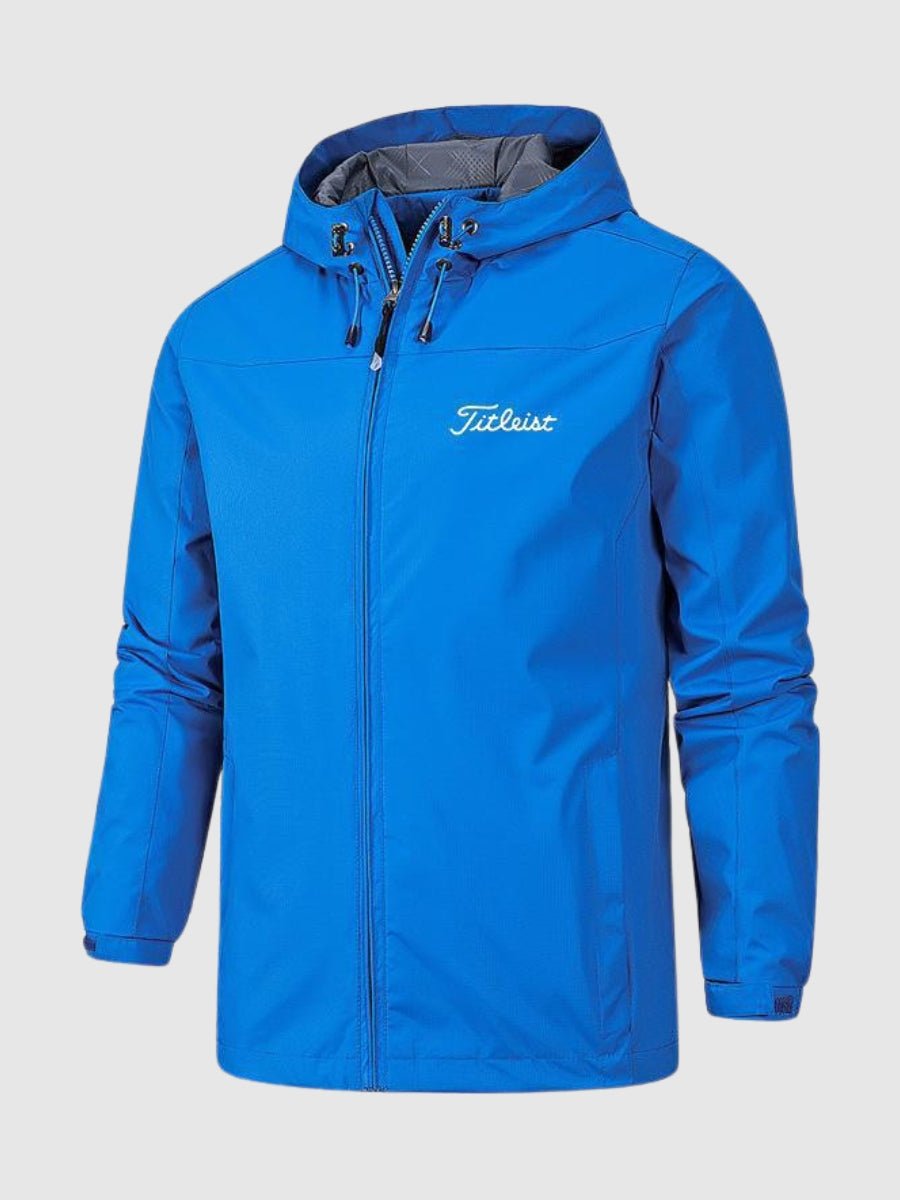 Blaue wasserdichte Jacke von Titleist, ideal für Outdoor-Aktivitäten. Hochwertiges Material, sportliches Design, perfekter Schutz bei Regen.