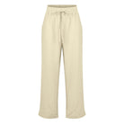 Beige Damen-Leinenhose mit elastischem Bund und Kordelzug. Ideal für Sommermode, lässiger Stil, atmungsaktiv und bequem. Perfekt für Freizeit.