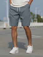 Graue Herren-Shorts aus Baumwolle, lässig, mit Kordelzug, ideal für Sommermode.