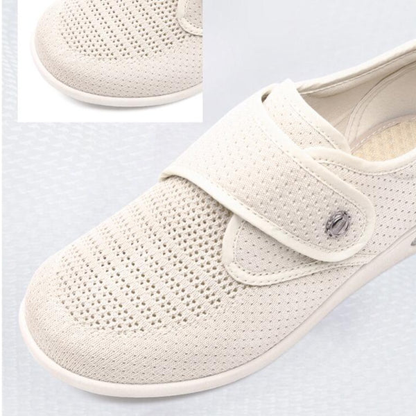 Bequemer, atmungsaktiver weißer Sneaker mit Klettverschluss, ideal für den Alltag. Perfekt für Damen, die Stil und Komfort suchen.