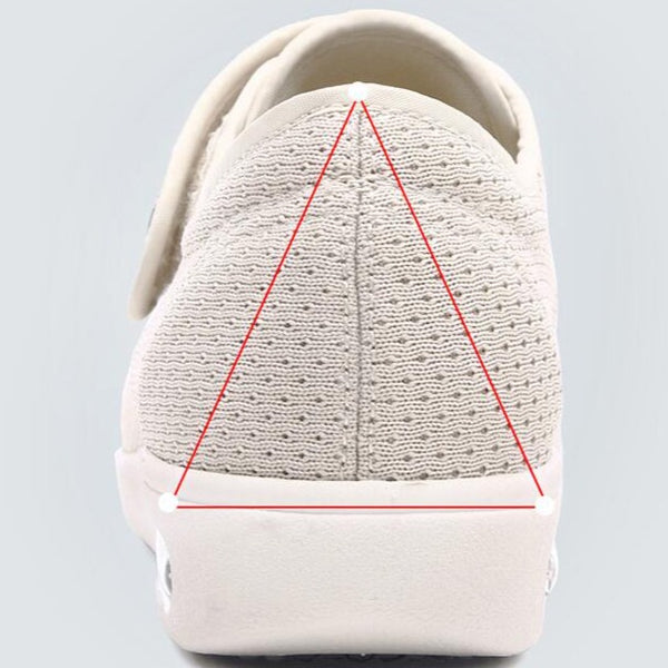 Beiger Sneaker mit atmungsaktivem Strickmaterial, ergonomischem Design und roter Linienmarkierung. Ideal für Komfort und Stil.