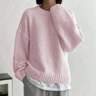 Damen-Pullover in Rosa, kuscheliger Strick, lässiger Oversize-Look, ideal für Herbst und Winter, modischer Freizeitstil, weiches Material.