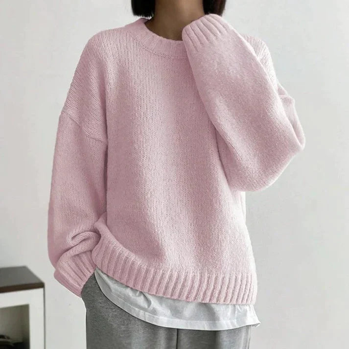 Damen-Pullover in Rosa, kuscheliger Strick, lässiger Oversize-Look, ideal für Herbst und Winter, modischer Freizeitstil, weiches Material.