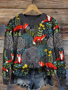 Bunter Pullover mit Fuchs- und Waldmotiv, ideal für Herbstmode. Hochwertiger Strick, lebendige Farben, einzigartiges Design, trendige Damenbekleidung.