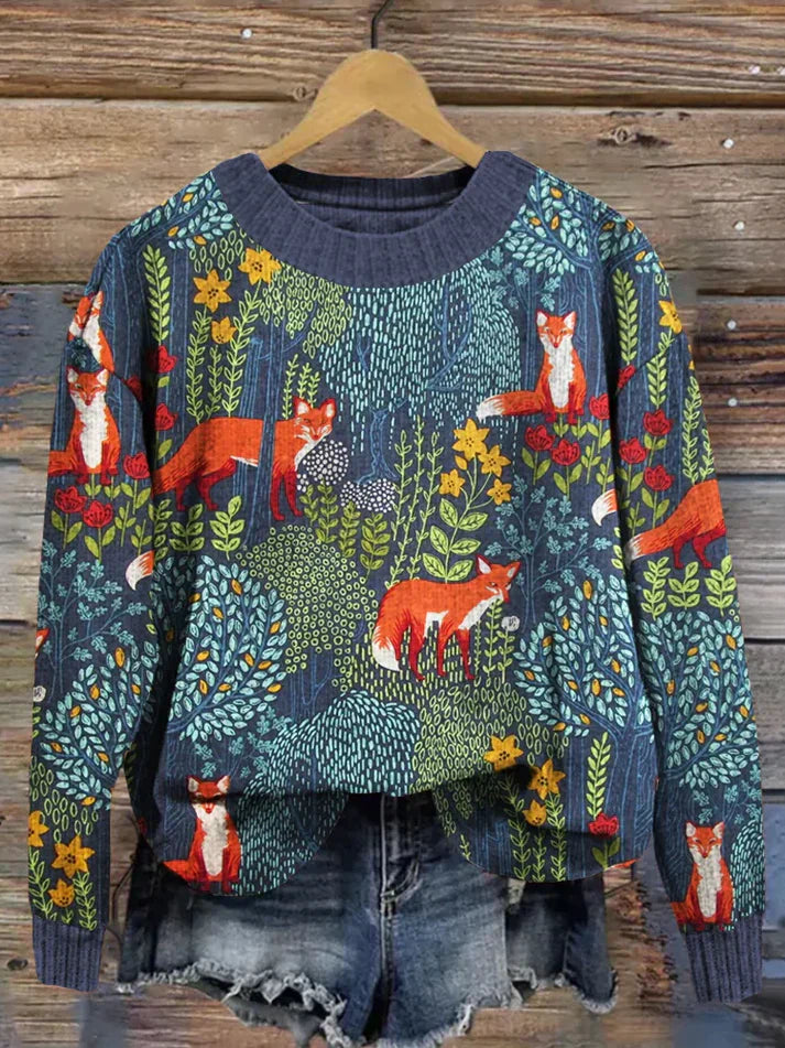 Bunter Pullover mit Fuchs-Motiv, Wald-Design und Blumenmuster, ideal für Herbstmode. Hochwertiger Strick, modisch und bequem.