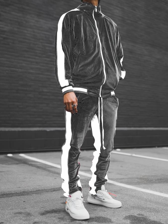 Schwarzer Samt-Trainingsanzug mit weißen Streifen, Herrenmode, sportlich, urbaner Stil.