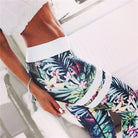 Damen-Sportset mit floralen Mustern, tropisches Design, ideal für Fitness und Yoga, atmungsaktiv und modisch, hohe Taille, bequem.