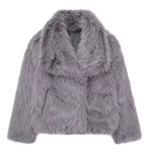 Grauer Kunstpelzmantel, flauschig und stilvoll, ideal für Wintermode. Perfekt für Damen, die nach einem modischen, warmen Look suchen.