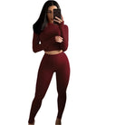 Damen Sportset in Rotwein, bestehend aus langärmligem Oberteil und Leggings. Perfekt für Fitness, Yoga und Freizeit. Bequem und stilvoll.