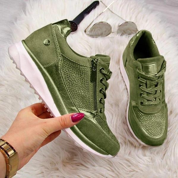 Grüne Damen-Sneaker mit Reißverschluss, stilvoll und bequem, ideal für Freizeit und Sport. Perfekt für modische Outfits und Alltagskomfort.