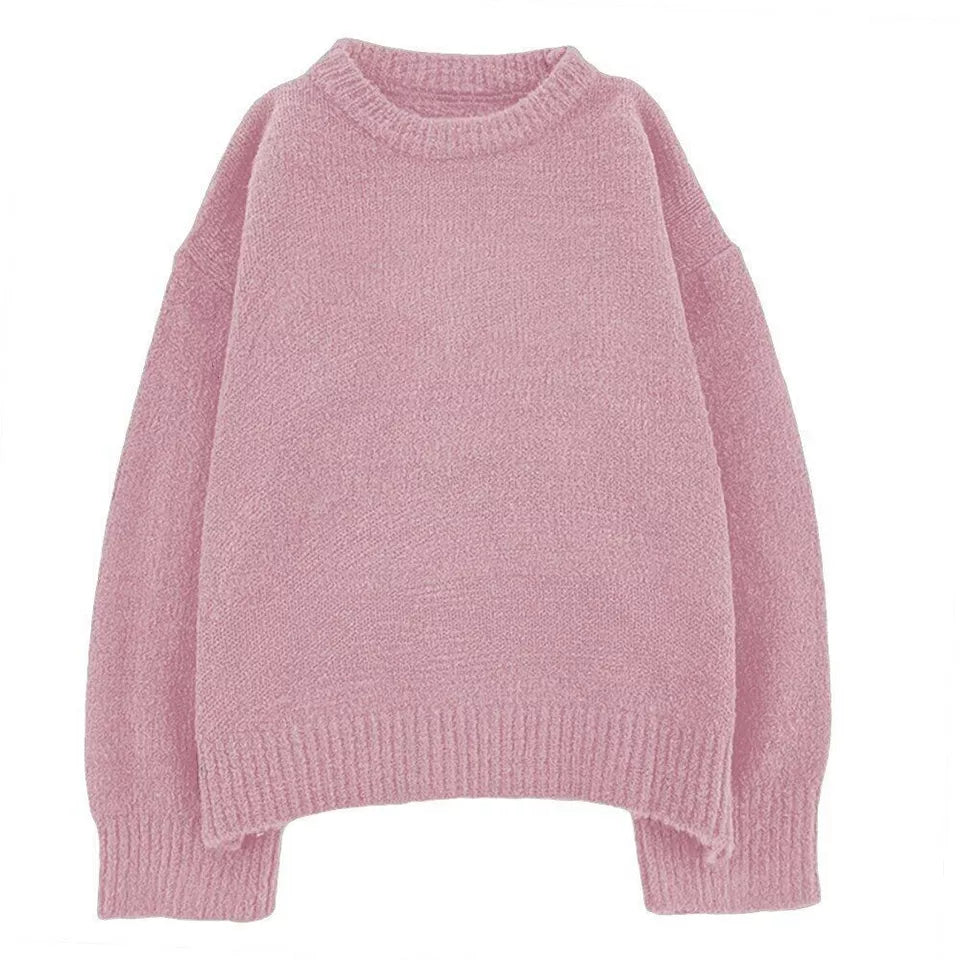 Rosa Damenpullover aus weichem Strick, oversized Design, ideal für Herbst und Winter. Modischer, gemütlicher Strickpullover für Damen.
