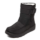 Schwarzer Winterstiefel mit Klettverschluss, rutschfester Sohle und warmem Innenfutter. Ideal für kalte Tage. Damenstiefel, wasserdicht.
