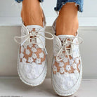 Stilvolle, luftige Damenschuhe mit Blumenmuster, ideal für den Sommer. Perfekt kombinierbar mit Jeans. Bequeme, modische Sneaker.
